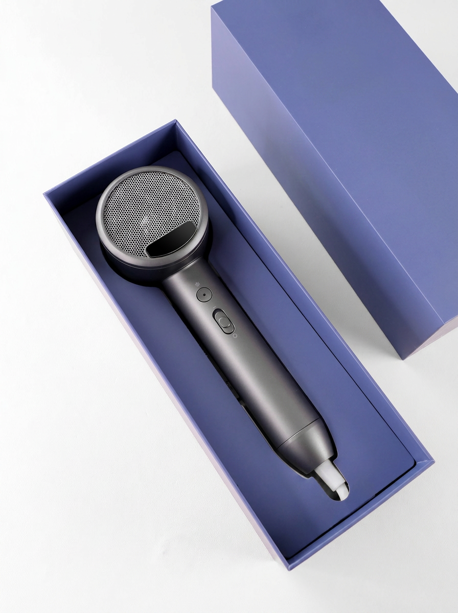 Graphite Halo hair dryer in a deep blue presentation box